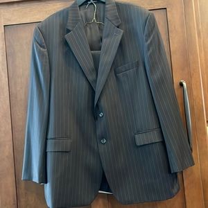 Worn once. Absolutely like new. Chaps 2 pc suit. 38x34. 48 L. 100% wool.